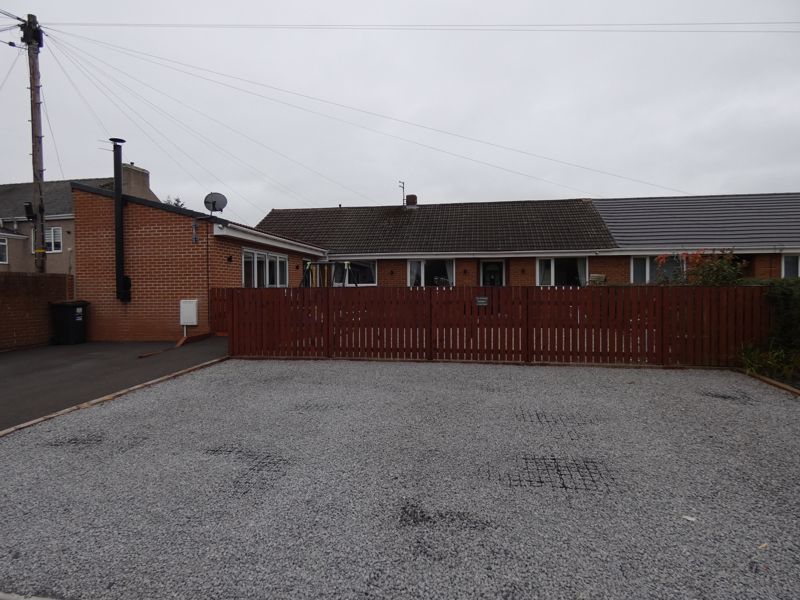 Front with Parking Drive- click for photo gallery